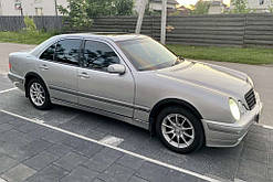 Накладки на арки (4 шт, чорні) для Mercedes E-сlass W210 1995-2002 рр