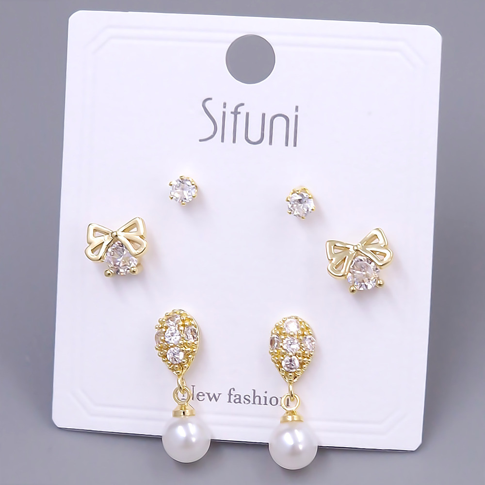 Набір із 3-х пар сережок-гвоздиків FJ. Позолота лимонного відтінку. Камені: циркон та перли