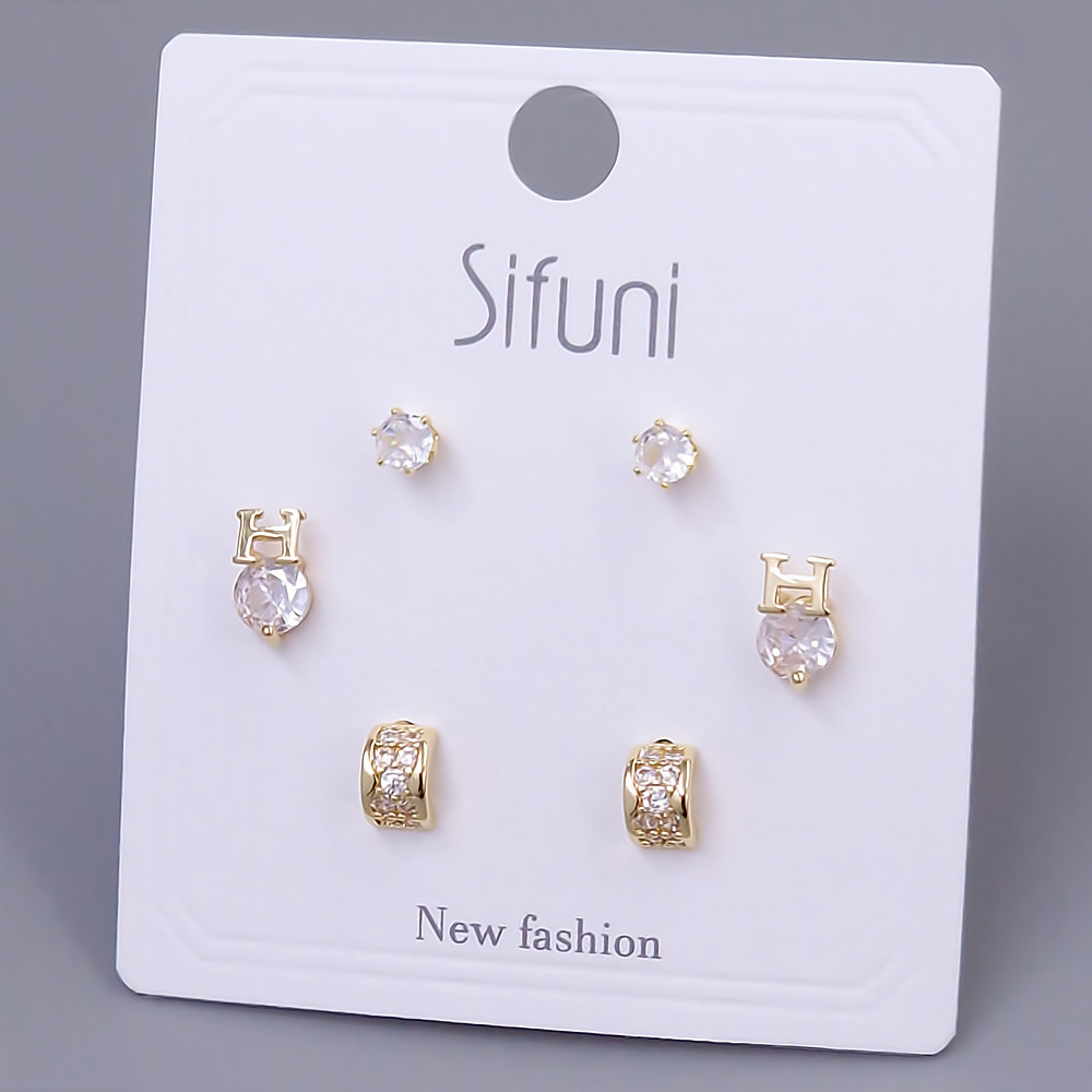 Набір із 3-х пар сережок-гвоздиків FJ. Позолота лимонного відтінку. Камені: циркон