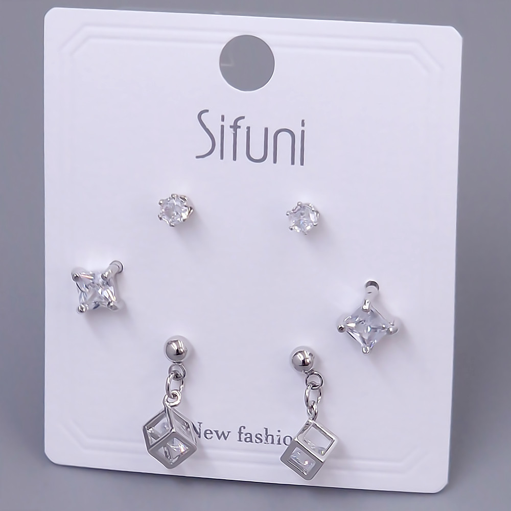 Набір із 3-х пар сережок-гвоздиків FJ. Родій. Камені: білий циркон