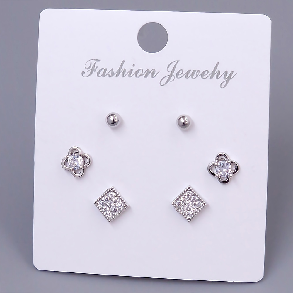 Набір із 3-х пар сережок-гвоздиків FJ. Родій. Камені: білий циркон