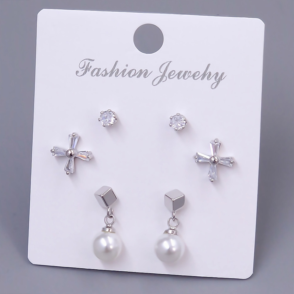 Набір із 3-х пар сережок-гвоздиків FJ. Родій. Камені: білий циркон та перли