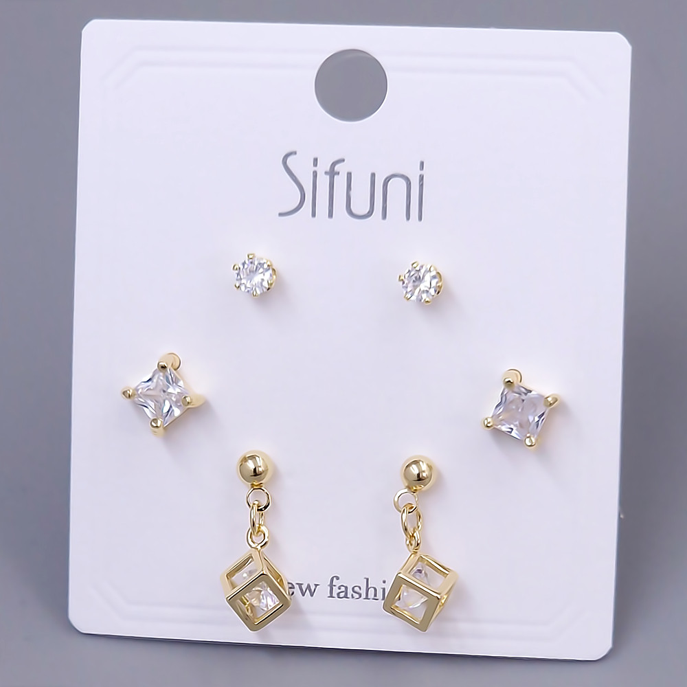 Набір із 3-х пар сережок-гвоздиків FJ. Позолота лимонного відтінку. Камені: циркон