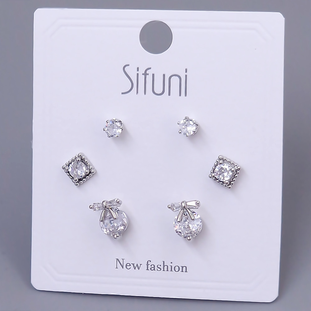 Набір із 3-х пар сережок-гвоздиків FJ. Родій. Камені: білий циркон