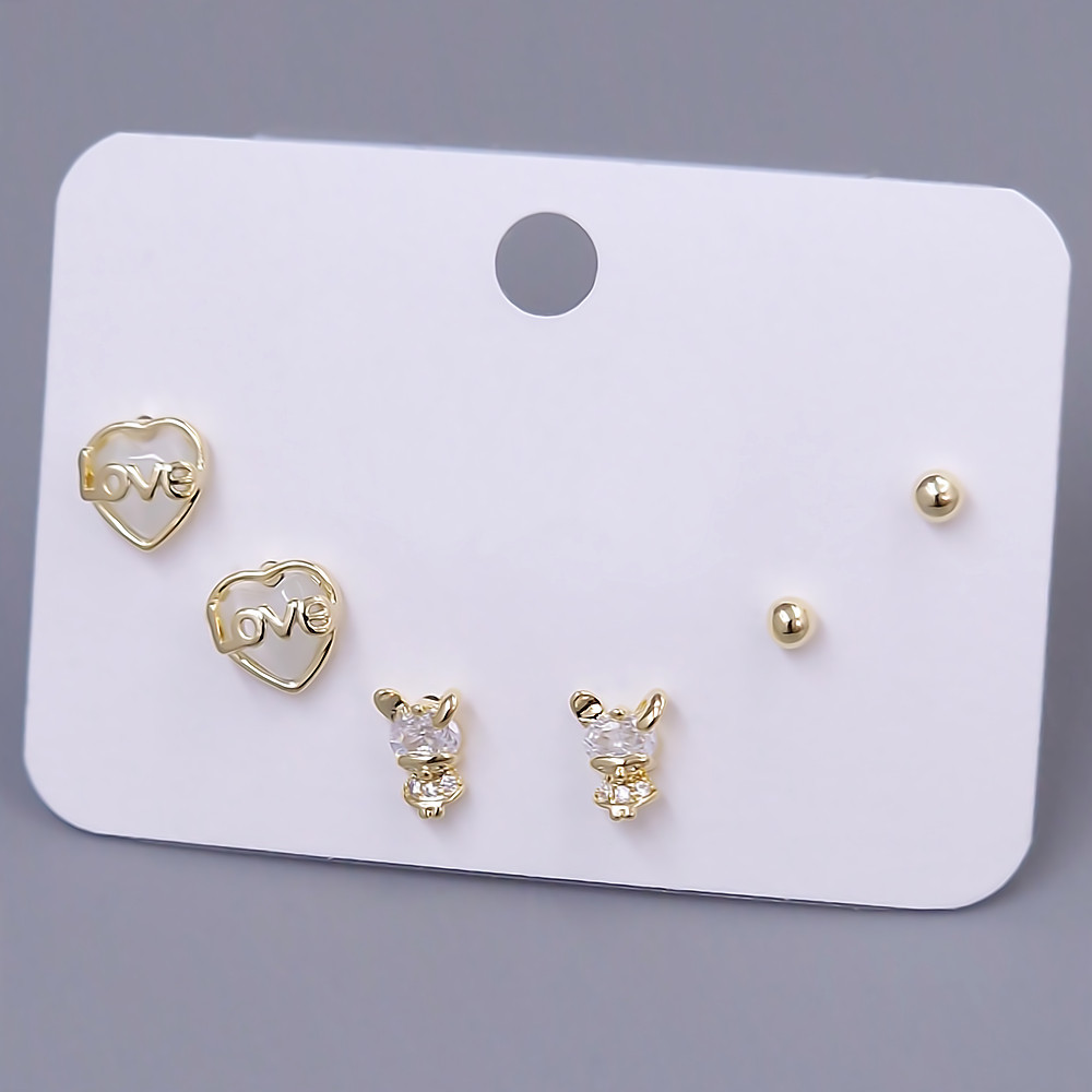 Набір із 3-х пар сережок-гвоздиків FJ. Позолота лимонного відтінку. Камені: циркон