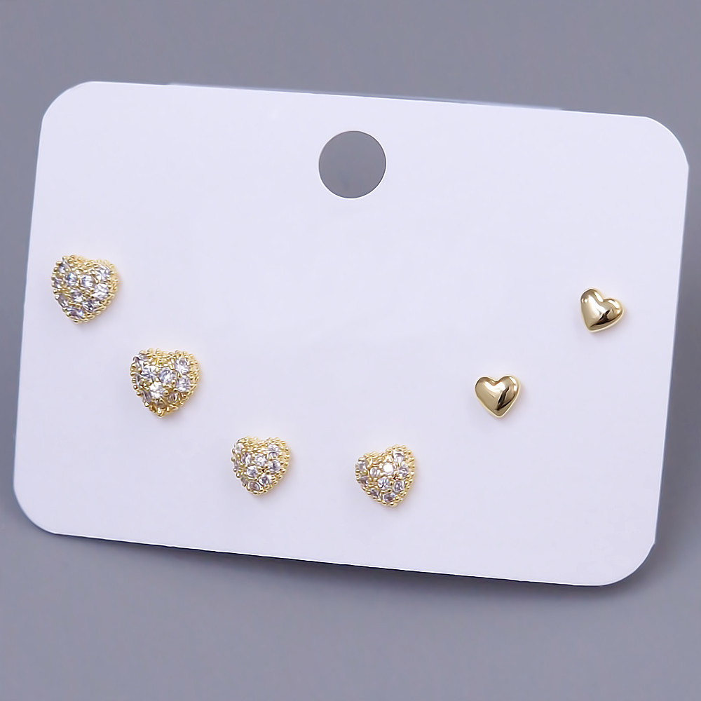 Набір із 3-х пар сережок-гвоздиків FJ. Позолота лимонного відтінку. Камені: циркон