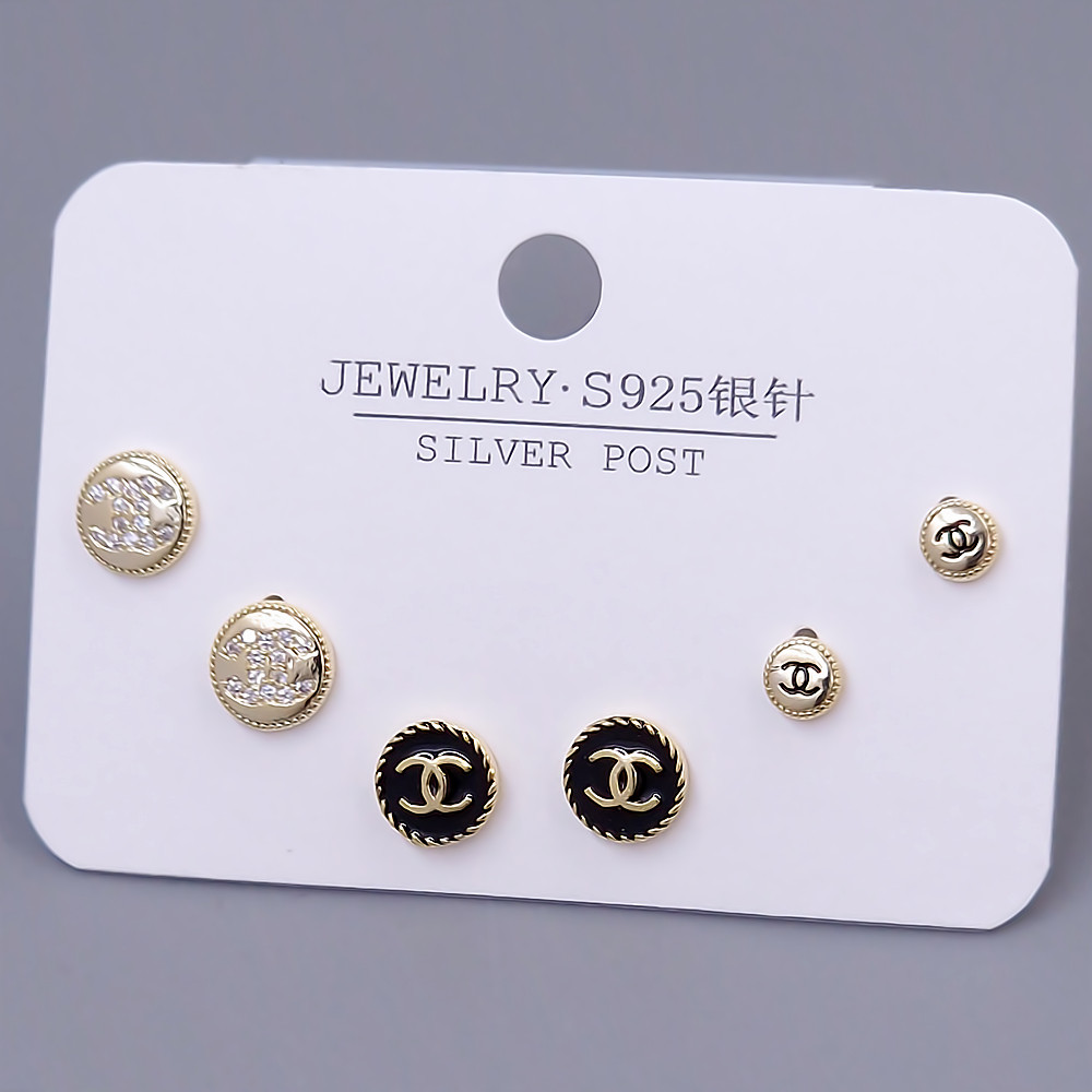 Набір із 3-х пар сережок-гвоздиків FJ. Позолота лимонного відтінку. Камені: циркон