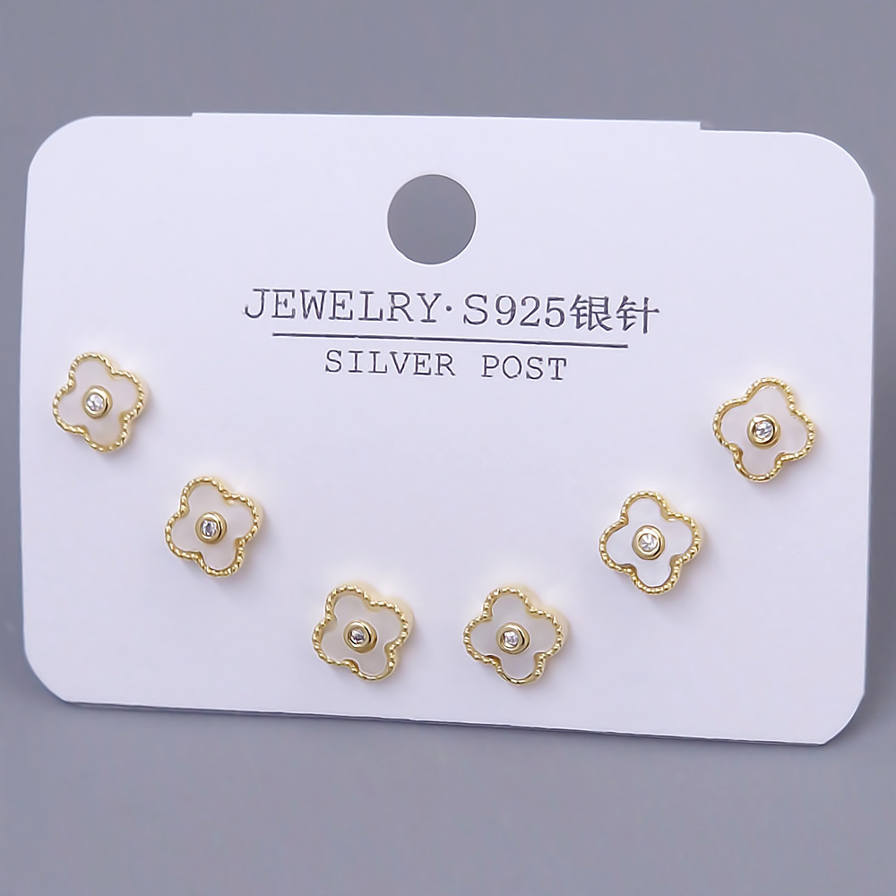 Набір із 3-х пар сережок-гвоздиків FJ. Позолота лимонного відтінку. Камені: циркон