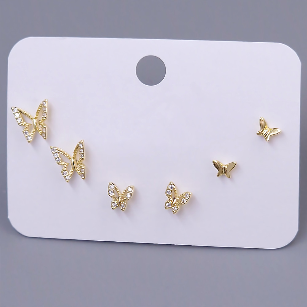 Набір із 3-х пар сережок-гвоздиків FJ. Позолота лимонного відтінку. Камені: циркон