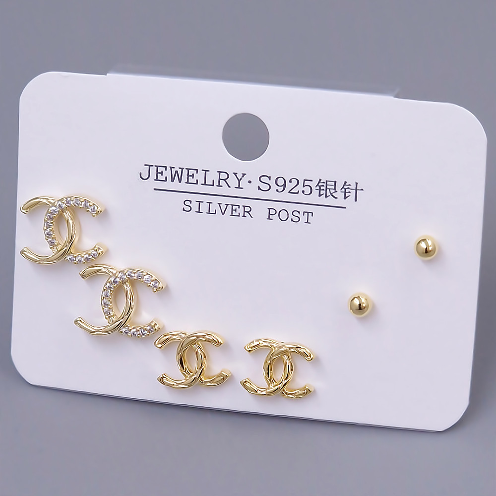 Набір із 3-х пар сережок-гвоздиків FJ. Позолота лимонного відтінку. Камені: циркон