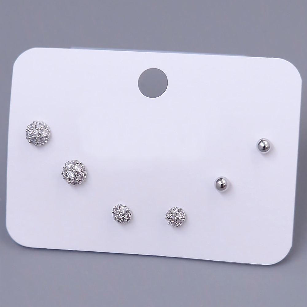 Набір із 3-х пар сережок-гвоздиків FJ. Родій. Камені: білий циркон