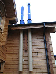 Дымоходы установленные вдоль фасада здания 27