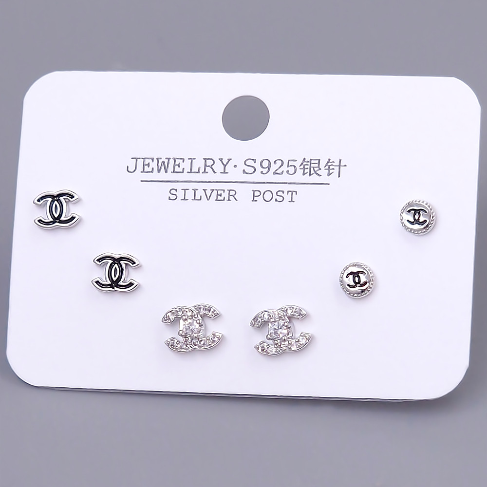 Набір із 3-х пар сережок-гвоздиків FJ. Родій. Камені: білий циркон