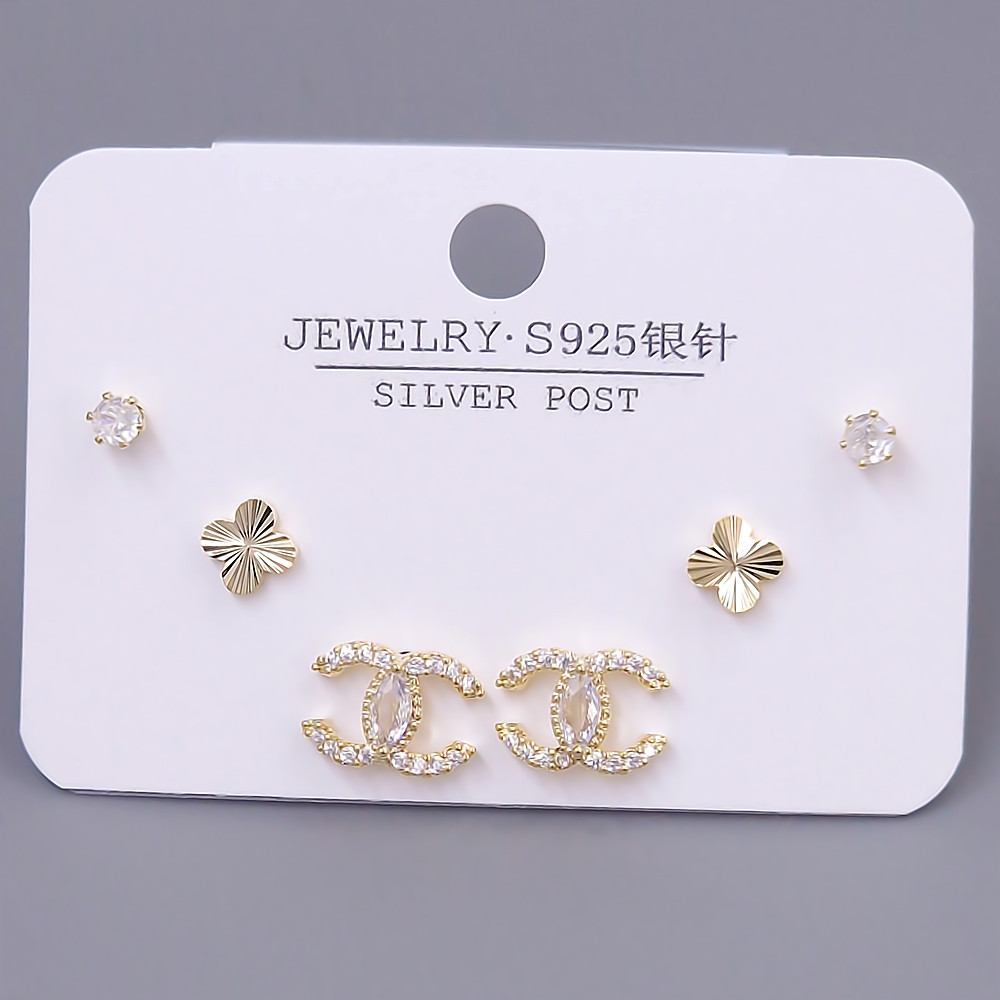 Набір із 3-х пар сережок-гвоздиків FJ. Позолота лимонного відтінку. Камені: циркон