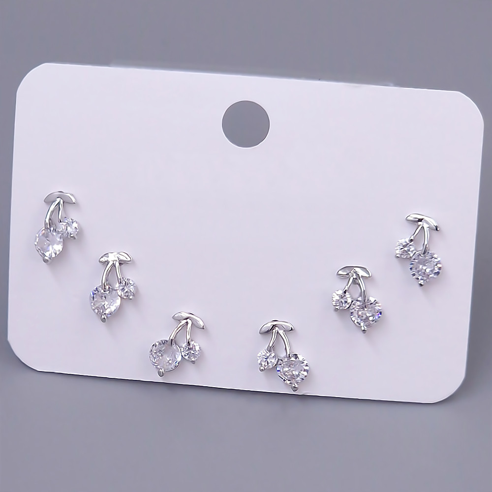 Набір із 3-х пар сережок-гвоздиків FJ. Родій. Камені: білий циркон