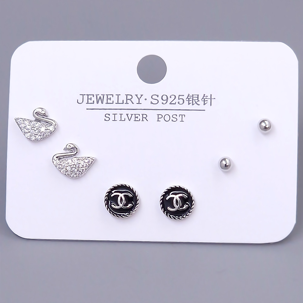 Набір із 3-х пар сережок-гвоздиків FJ. Родій. Камені: білий циркон