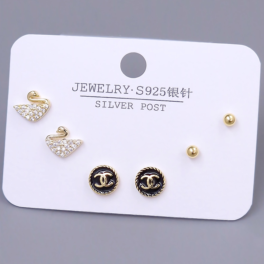 Набір із 3-х пар сережок-гвоздиків FJ. Позолота лимонного відтінку. Камені: циркон