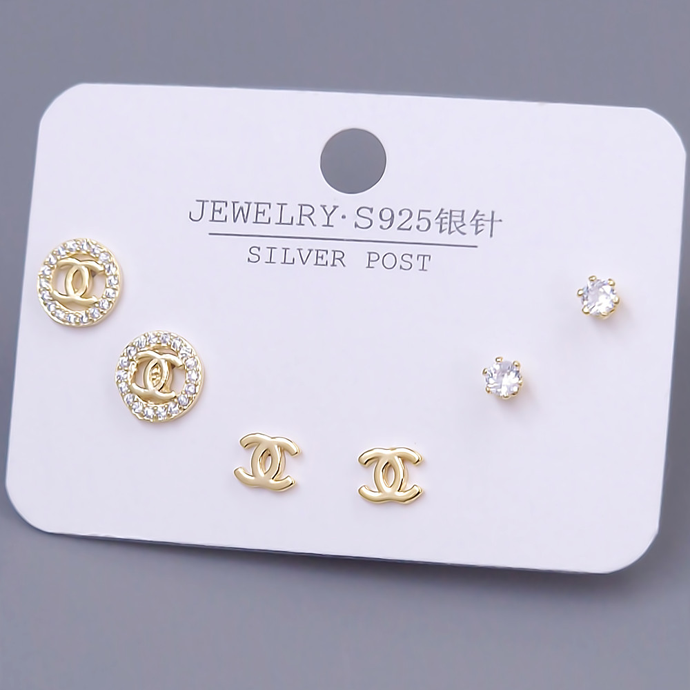 Набір із 3-х пар сережок-гвоздиків FJ. Позолота лимонного відтінку. Камені: циркон