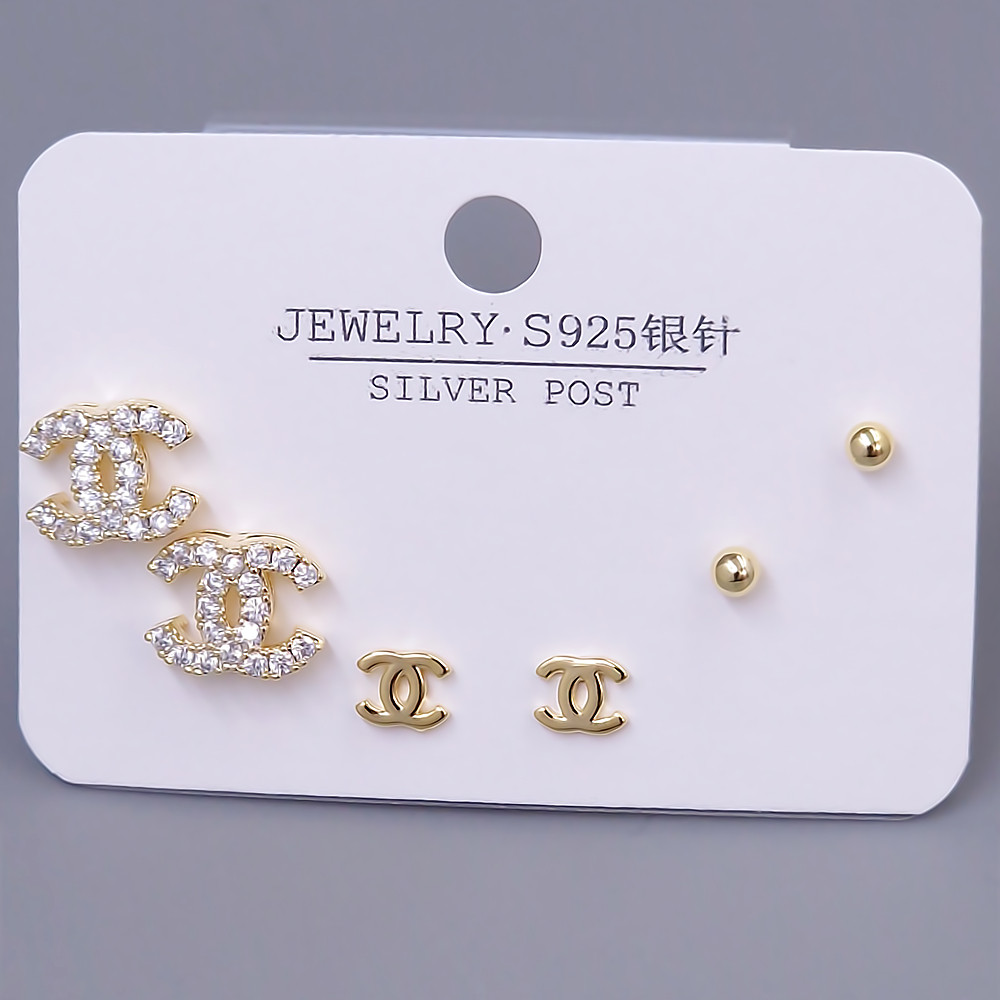 Набір із 3-х пар сережок-гвоздиків FJ. Позолота лимонного відтінку. Камені: циркон