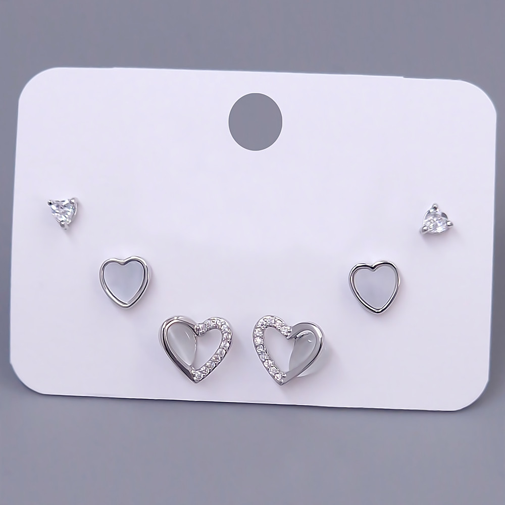 Набір із 3-х пар сережок-гвоздиків FJ. Родій. Камені: білий циркон