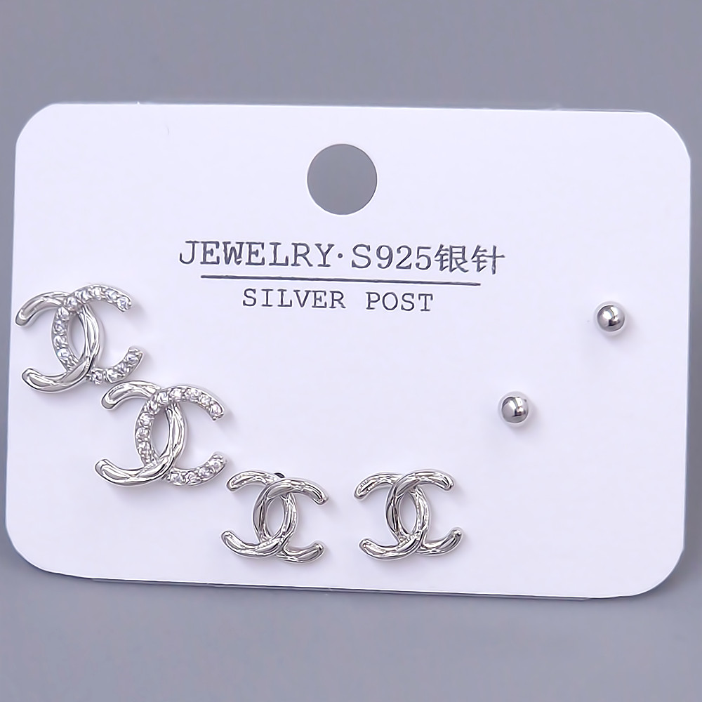 Набір із 3-х пар сережок-гвоздиків FJ. Родій. Камені: білий циркон