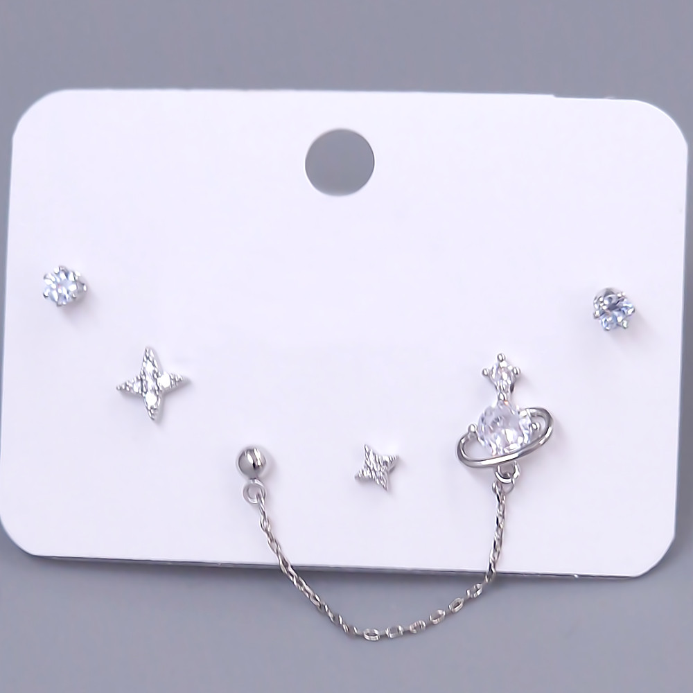 Набір із 3-х пар сережок-гвоздиків FJ. Родій. Камені: білий циркон