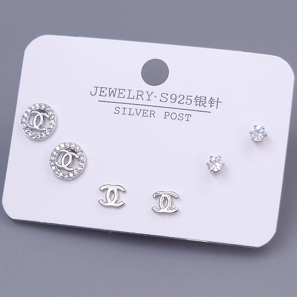 Набір із 3-х пар сережок-гвоздиків FJ. Родій. Камені: білий циркон