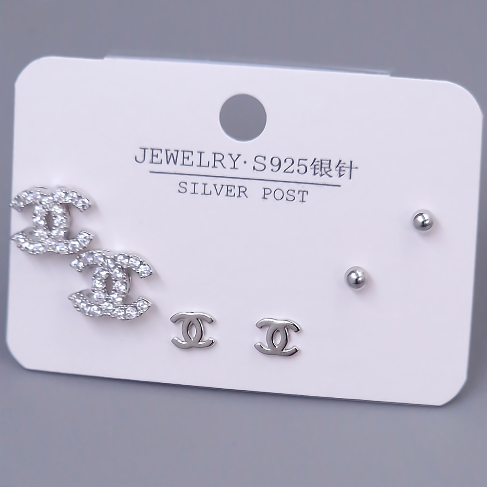 Набір із 3-х пар сережок-гвоздиків FJ. Родій. Камені: білий циркон