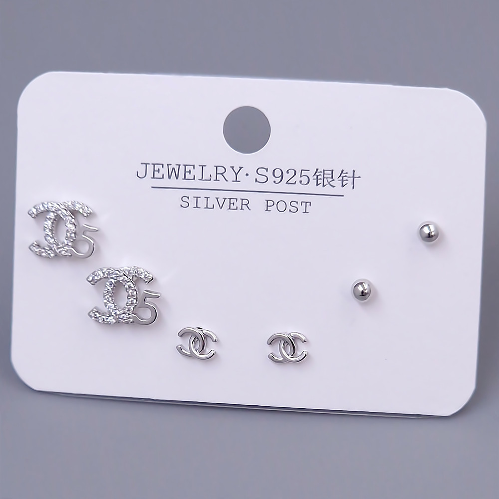 Набір із 3-х пар сережок-гвоздиків FJ. Родій. Камені: білий циркон