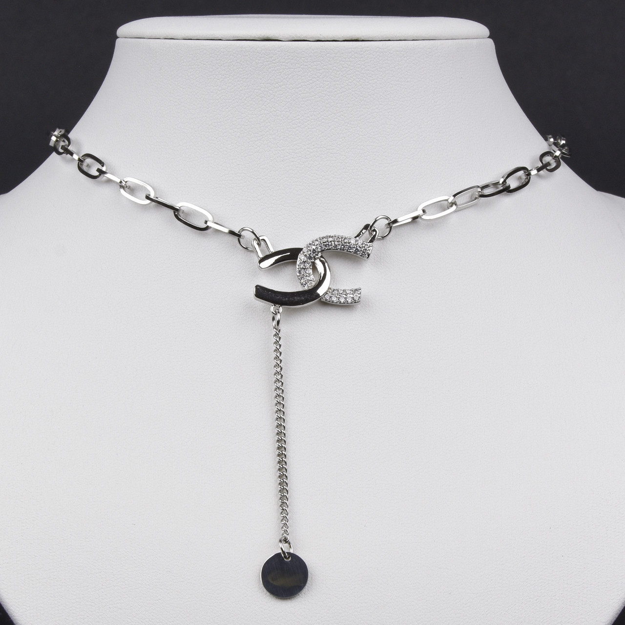 Ланцюг із кулоном сріблястого кольору Stainless Steel брендовий з білими стразами та висувкою монетка довжина 55 см