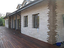 Облицовка травертином фасада частного дома 19
