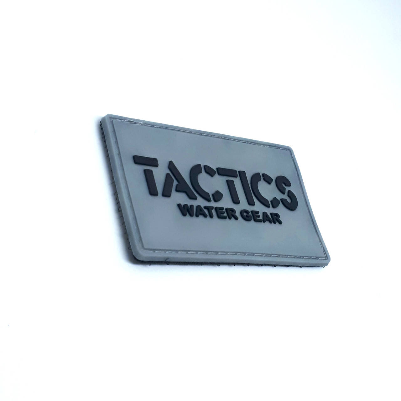 

Шеврон резиновый на липучке " Tactics" 7,5 см х 4,5 см