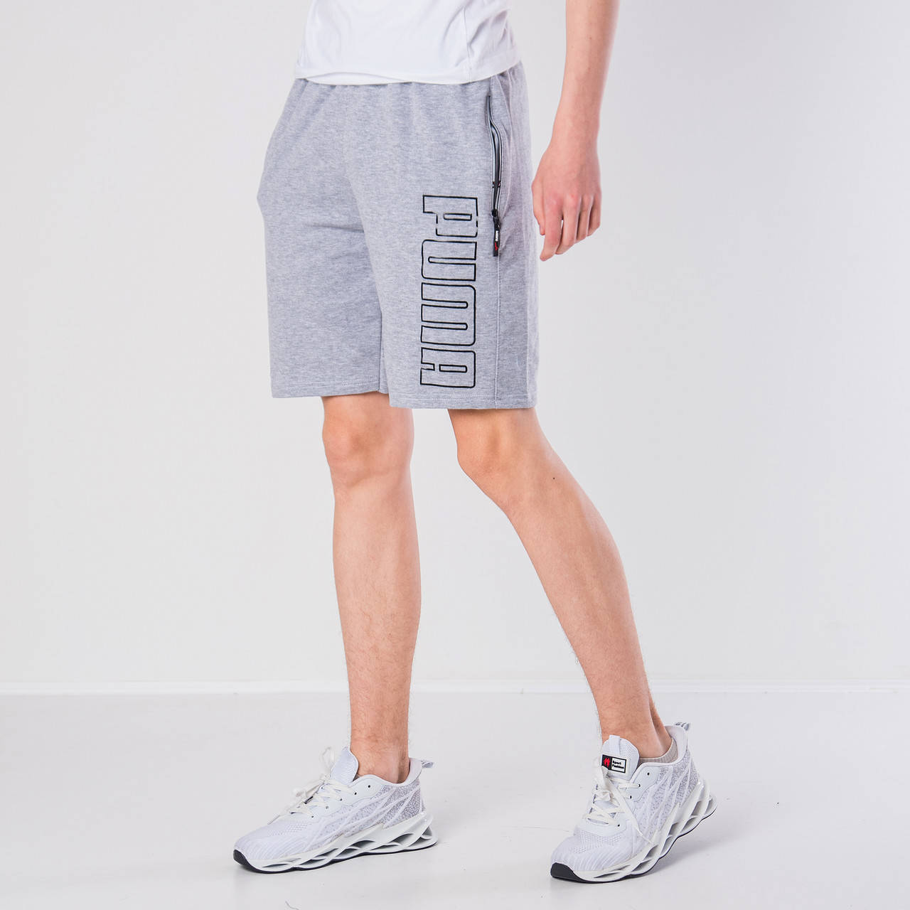 

Мужские трикотажные шорты Puma, светло-серого цвета., Серый