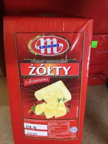 

Сыр желтый з дырками Mlekovita