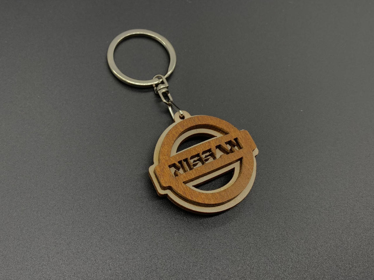 

Брелок деревянный Nissan. 4.5см, Коричневый