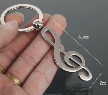 

Брелок металл подарок музыканту скрипичный ключ серебристый отличное качество