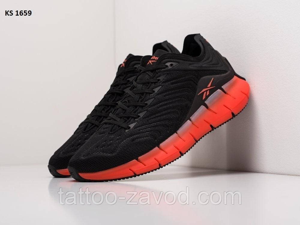 Кросівки чоловічі чорні з жовтогарячою підошвою текстильні 41 Reebok Zig Kinetica, фото 1