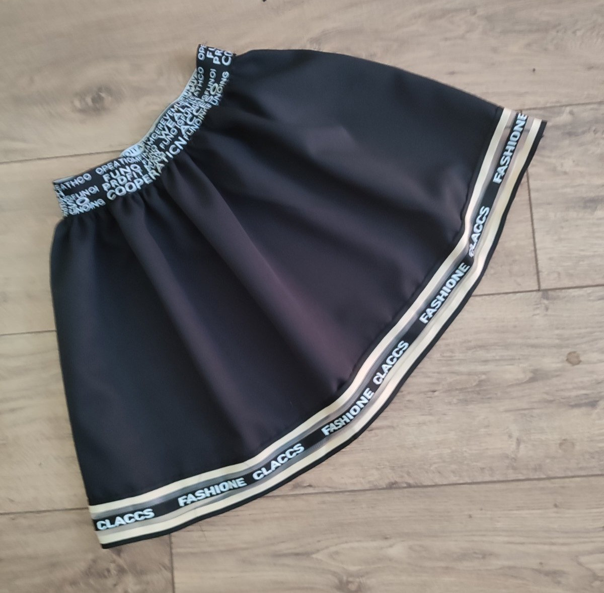 Опт Спідничка з широкою смужкою по низу р 116-140 чорна