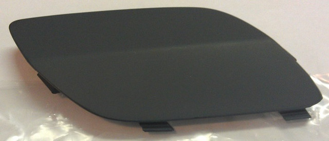 Кришка (заглушка) відвести форсунки фаромивача права (ґрунтована під фарбування) GM 1400772 93183754 13143156 OPEL Astra-H 3 door hatch (хечбек)