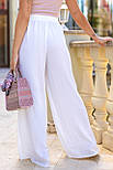 Жіночі штани палаццо літні широкі з жатки з резинкою на поясі (р. 42-52) 18121091, фото 6