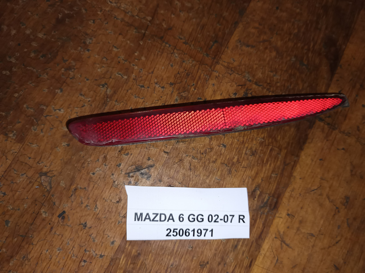 Рефлектор заднього бампера правий 25061971 для Mazda 6 GG 02-07, фото 1