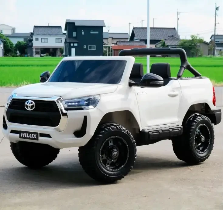 Дитячий електромобіль на акумуляторі Джип Toyota Hilux M 4919 на радіокеруванні дітей 3-8 років білий