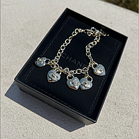 Сережки та браслет з серцями позолота