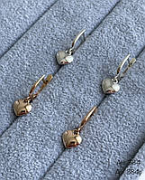 Срібні сережки з сердечками