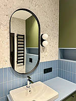 Овальне дзеркало в металевій рамі. Дзеркало у ванну, чорний овал