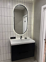 Овальне дзеркало в металевій рамі з фоновою підсвіткою. Дзеркало у ванну, чорний овал з задньою лед підсвіткою