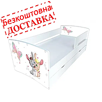 Дитяче ліжко з принтом Зайчики