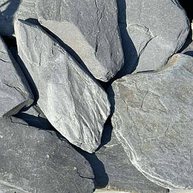 Фасадна плитка плашка із чорного сланцю окатана дикий камінь для цоколя, фасаду та садового декору