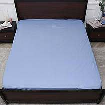 Захисне натяжне простирадло з бязі на гумці двоспальне (160*200*25) бавовняне однотонне блакитне, фото 3