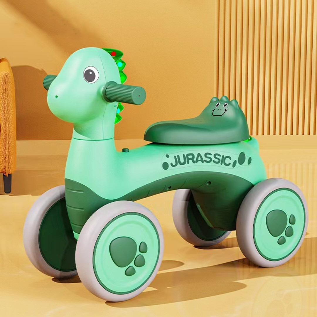 Дитяча каталка-толокар Динозаврик M 5853E з підсвіткою й музикою Зелений, фото 1